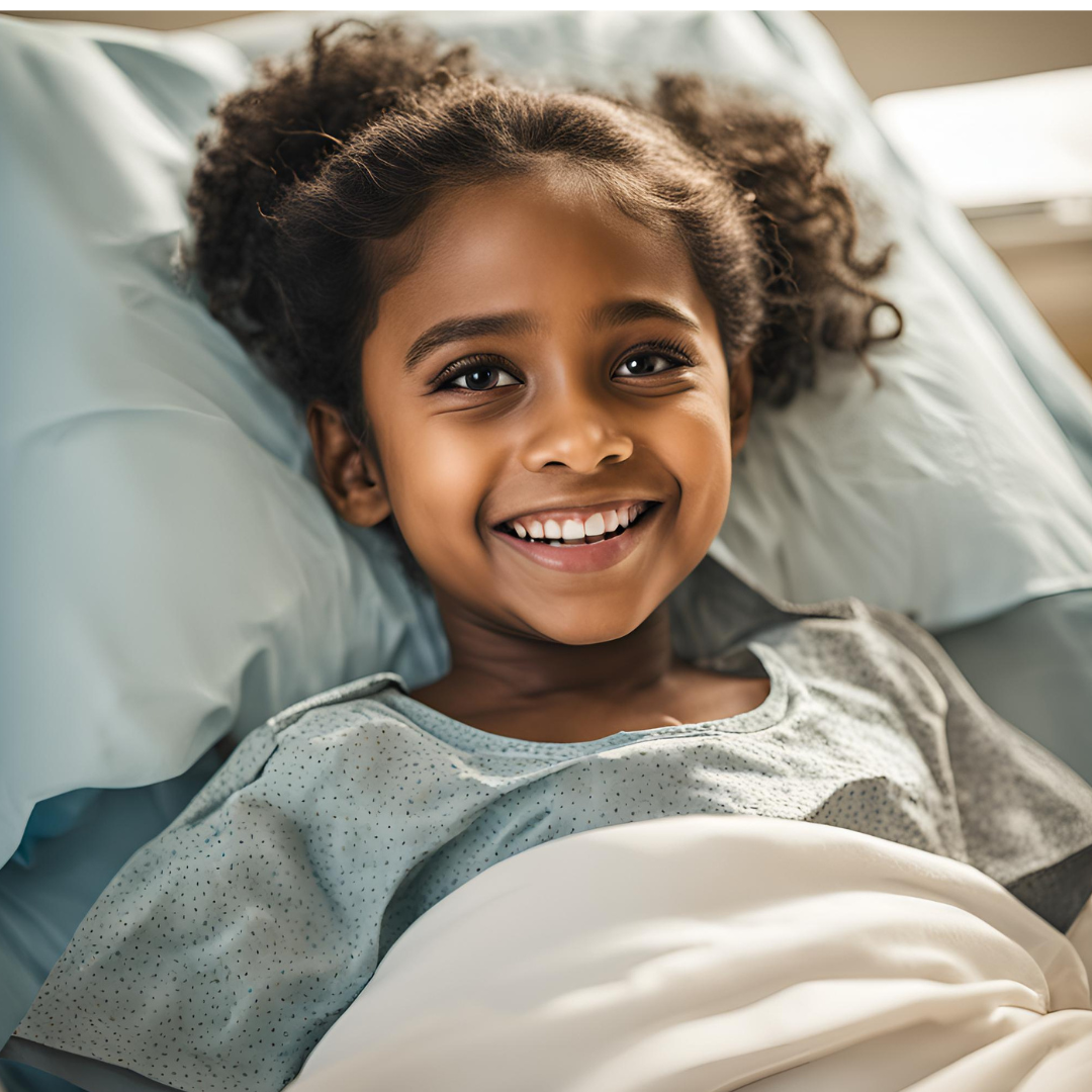 little brown girl in hospital bed